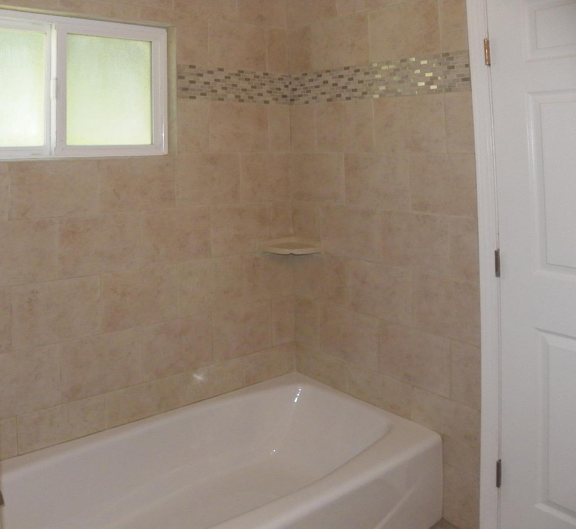 254 Hames Road Corralitos, CA 95076 - Photo 17 of 19 a close up of a bathtub in a bathroom