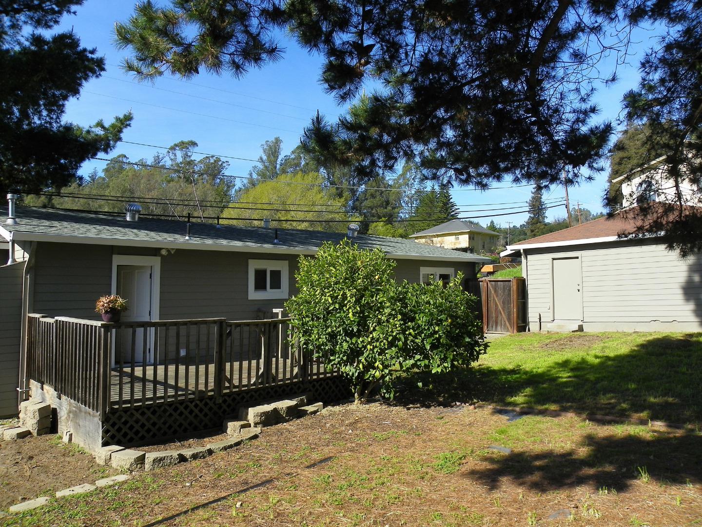254 Hames Road Corralitos, CA 95076 - Photo 4 of 19 a front view of a house with a yard