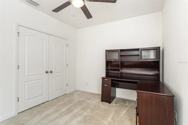 a bedroom with furniture and a bed