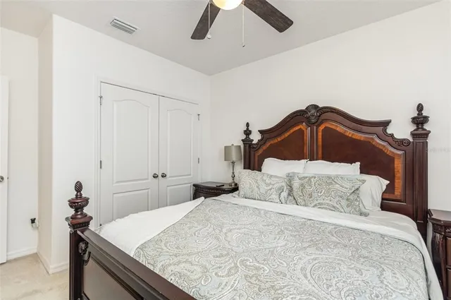 a bedroom with a bed and a dresser