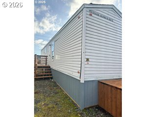 77940 Highway 99, Unit 19 Cottage Grove, OR 97424 - Photo 1 of 5 a view of a house with a door