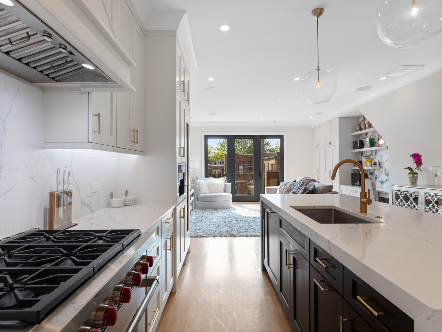 2252 North Orchard Street, Unit 3S Chicago, IL 60614 - Photo 11 of 31 a kitchen with granite countertop a stove and a sink