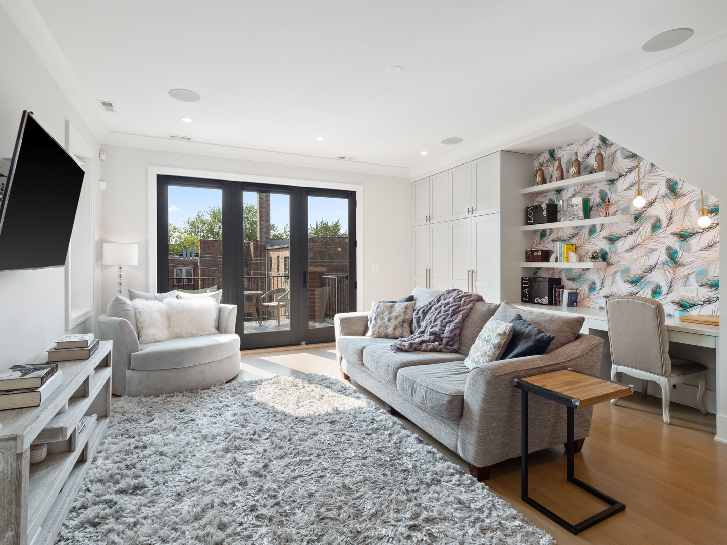 2252 North Orchard Street, Unit 3S Chicago, IL 60614 - Photo 13 of 31 a living room with furniture and a flat screen tv