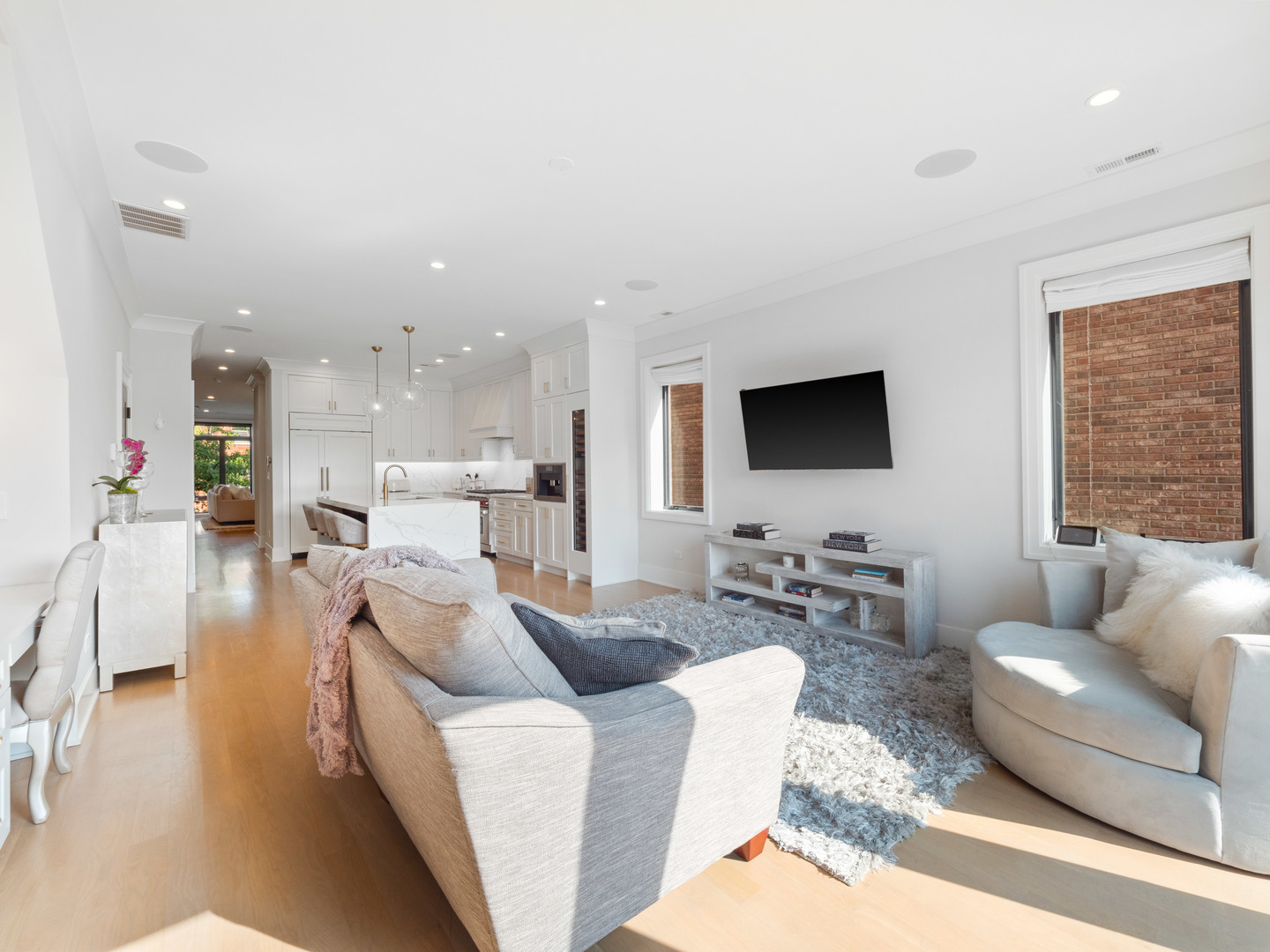 2252 North Orchard Street, Unit 3S Chicago, IL 60614 - Photo 16 of 31 a living room with furniture and a flat screen tv