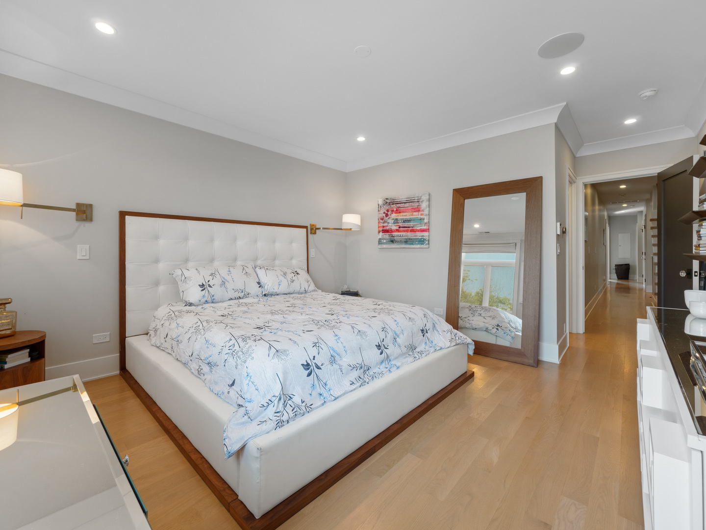 2252 North Orchard Street, Unit 3S Chicago, IL 60614 - Photo 19 of 31 a bedroom with a large bed and a chandelier