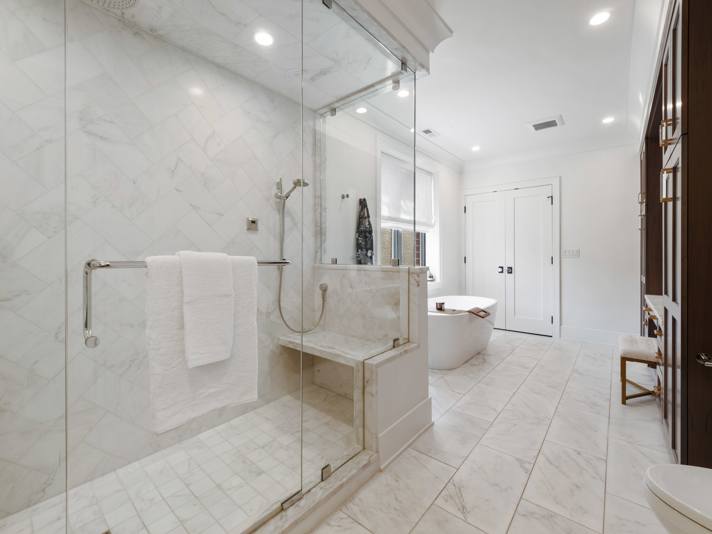 2252 North Orchard Street, Unit 3S Chicago, IL 60614 - Photo 22 of 31 a large bathroom with a glass shower door and a sink