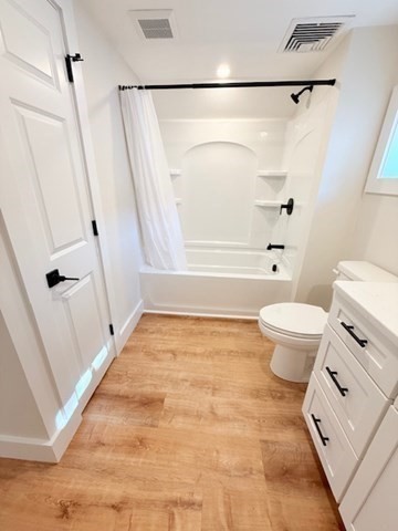 244 Main Street, Unit 2 North Andover, MA 01845 - Photo 31 of 36 a bathroom with a toilet and a shower