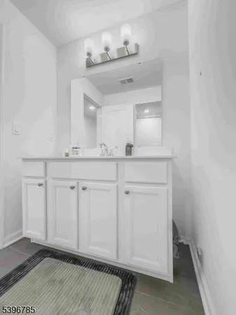 a view of cabinets and wooden floor