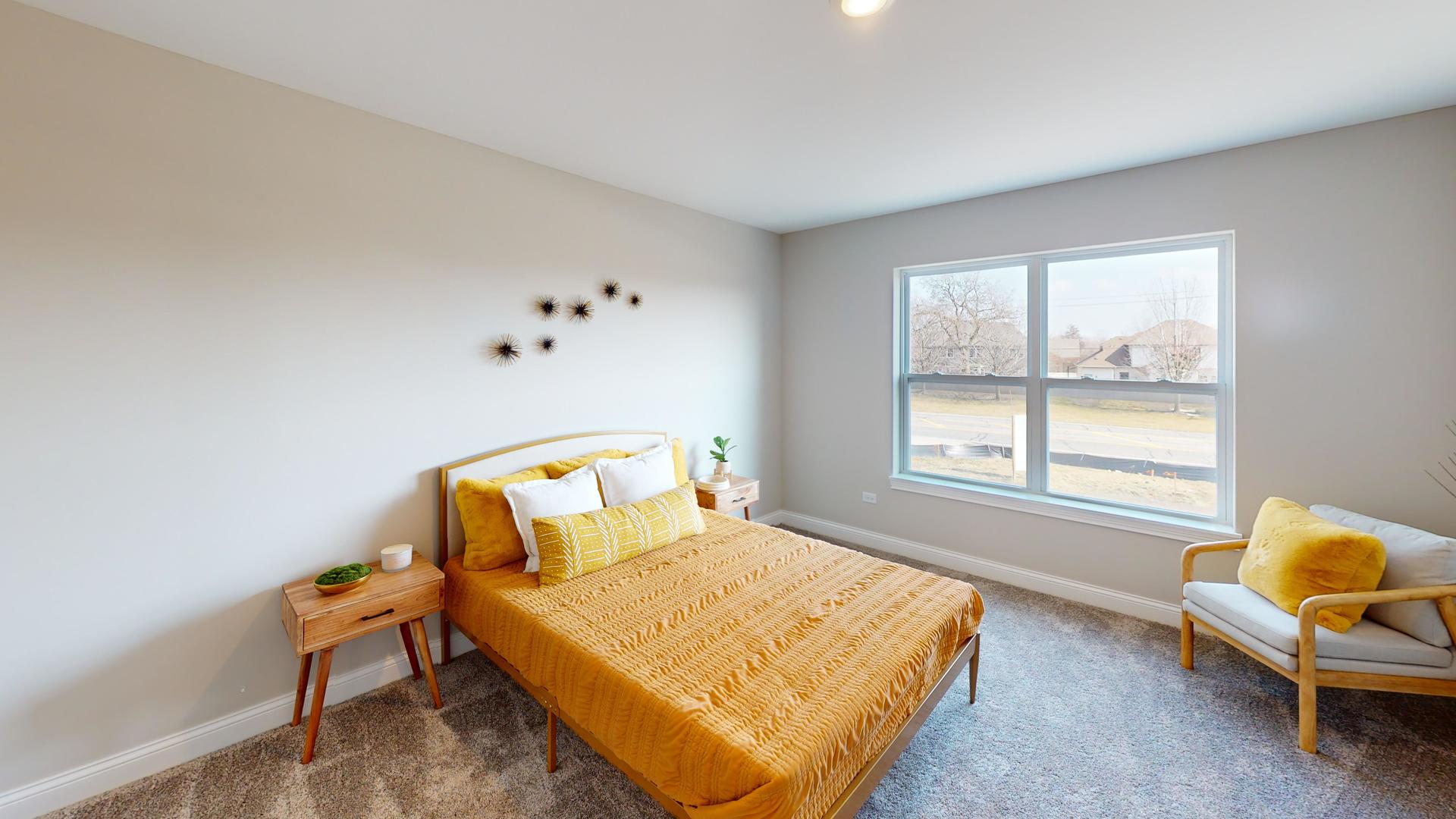 4S830 Deerpath Road Aurora, IL 60506 - Photo 17 of 25 a bedroom with a bed and a window