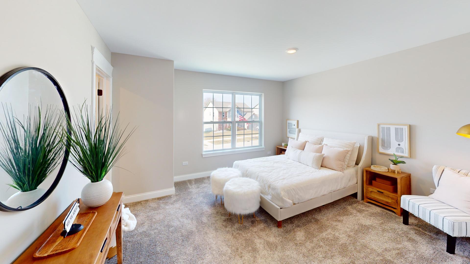 4S830 Deerpath Road Aurora, IL 60506 - Photo 18 of 25 a bedroom with bed and a potted plant