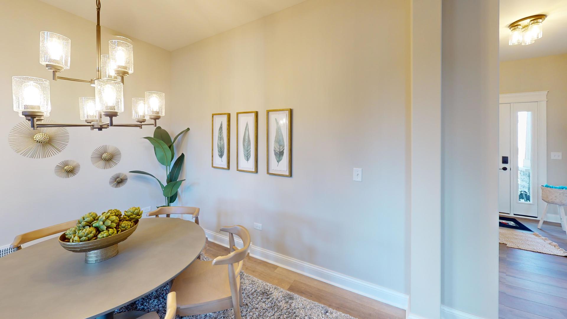 4S830 Deerpath Road Aurora, IL 60506 - Photo 3 of 25 a view of a dining room with furniture and wooden floor
