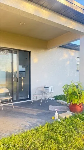 a bathroom with a bathtub and a window