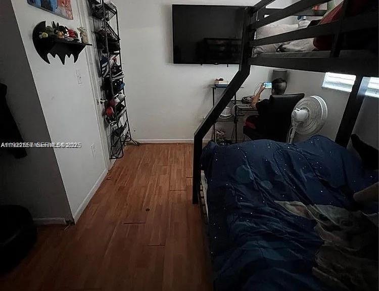 8600 Southwest 133rd Avenue Road, Unit 423 Miami, FL 33183 - Photo 12 of 17 a view of entryway and hall with wooden floor