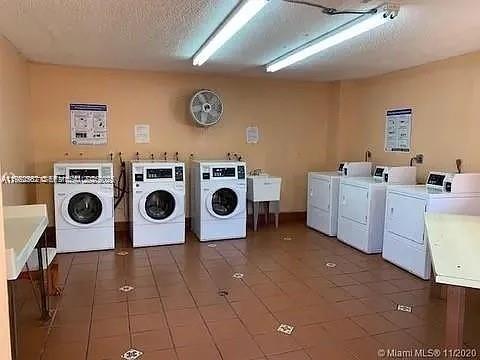 8600 Southwest 133rd Avenue Road, Unit 423 Miami, FL 33183 - Photo 17 of 17 a utility room with dryer and washer