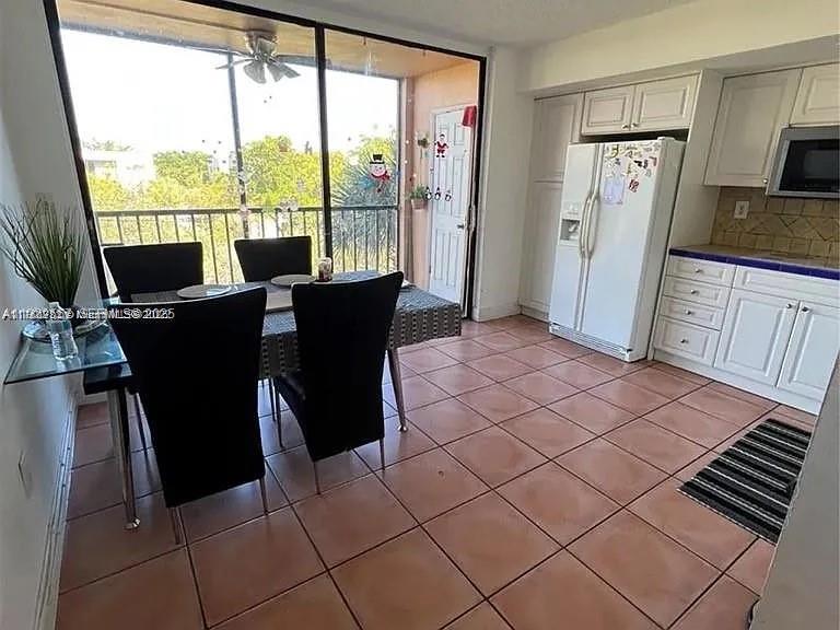 8600 Southwest 133rd Avenue Road, Unit 423 Miami, FL 33183 - Photo 6 of 17 a view of a living room with furniture