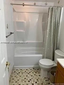 8600 Southwest 133rd Avenue Road, Unit 423 Miami, FL 33183 - Photo 10 of 17 a bathroom with a toilet and a shower