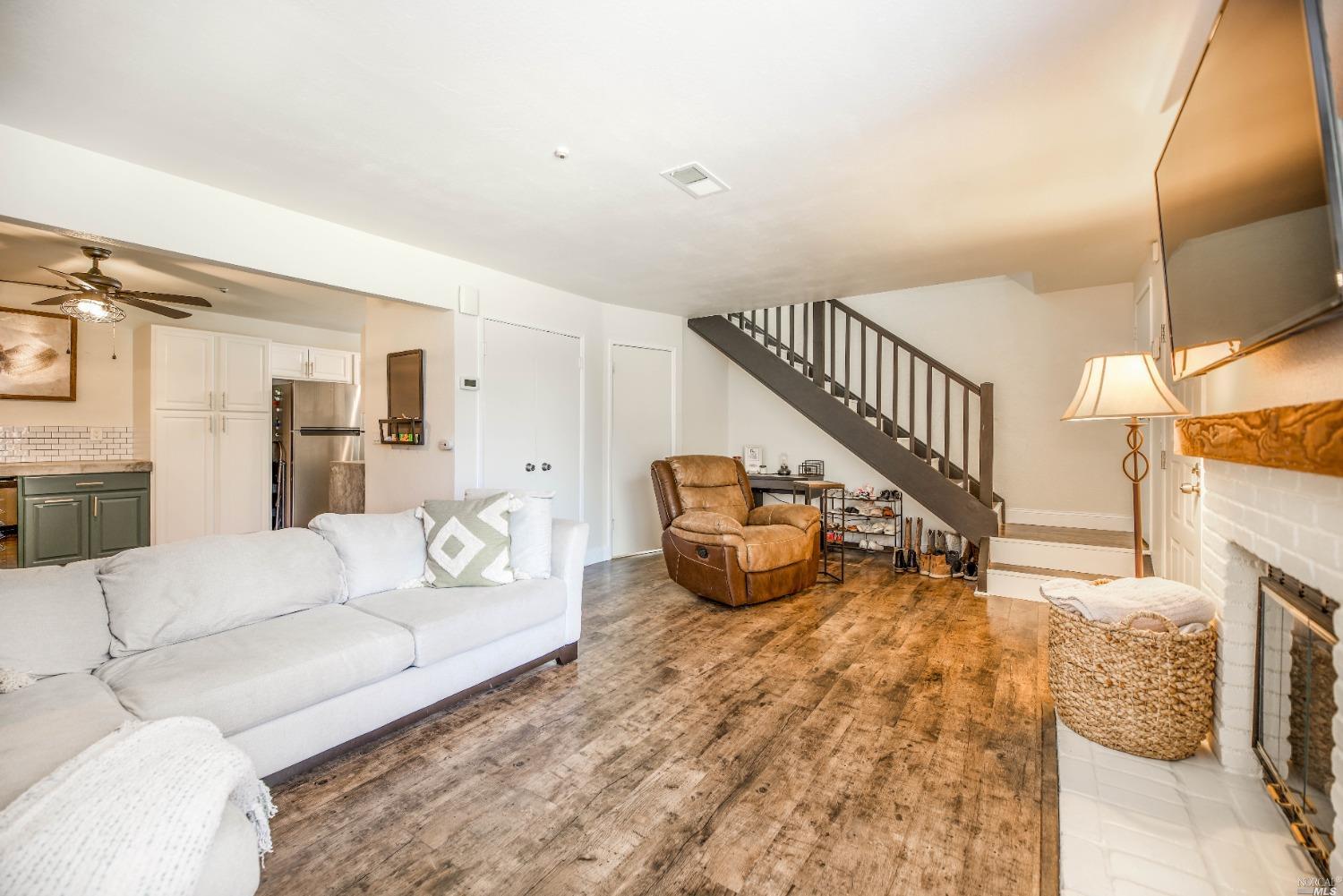 1423 Gold Way Rohnert Park, CA 94928 - Photo 1 of 1 a living room with furniture and a wooden floor