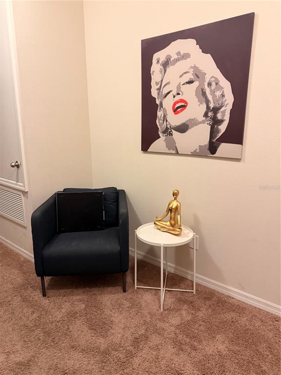 7843 Hardenton Street Windermere, FL 34786 - Photo 7 of 19 a living room with a couch and a table