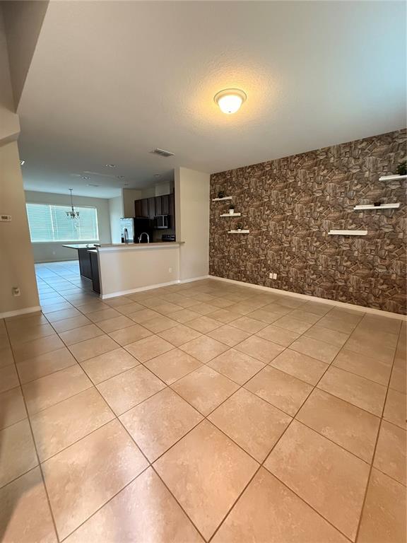 7843 Hardenton Street Windermere, FL 34786 - Photo 8 of 19 a living room with a couch