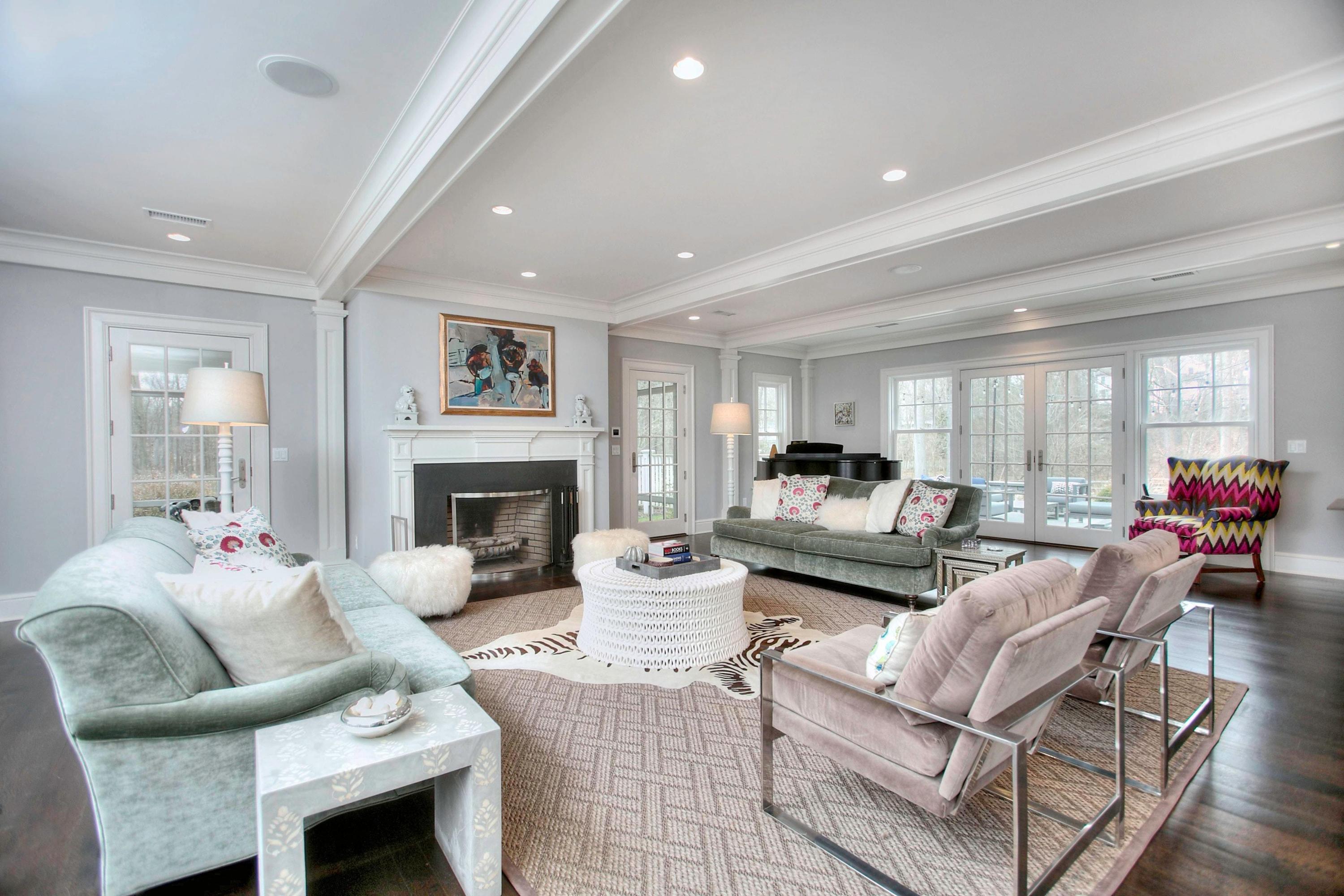 24 Cross Road Darien, CT 06820 - Photo 15 of 53 a living room with furniture and a fireplace