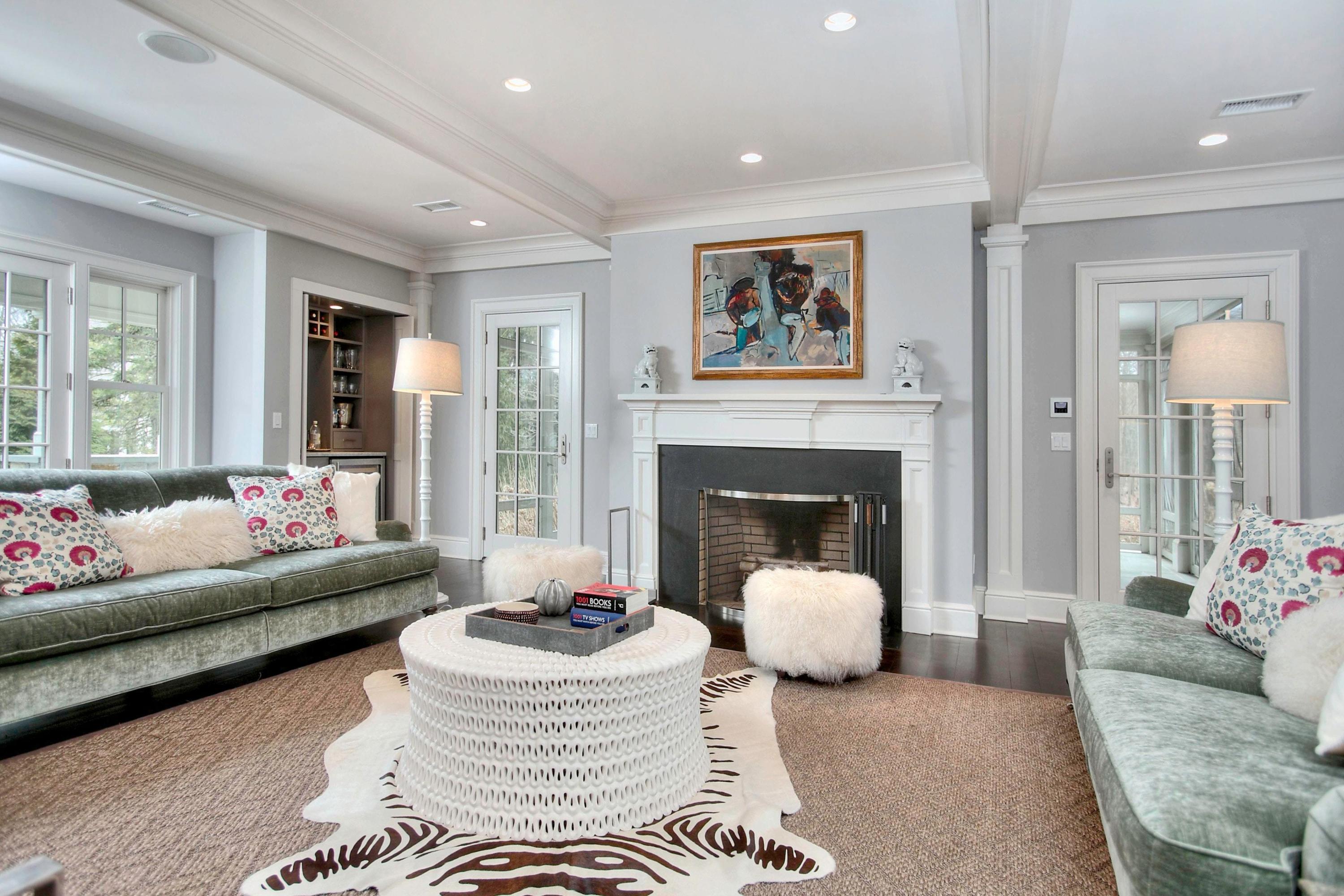 24 Cross Road Darien, CT 06820 - Photo 16 of 53 a living room with furniture and a large window