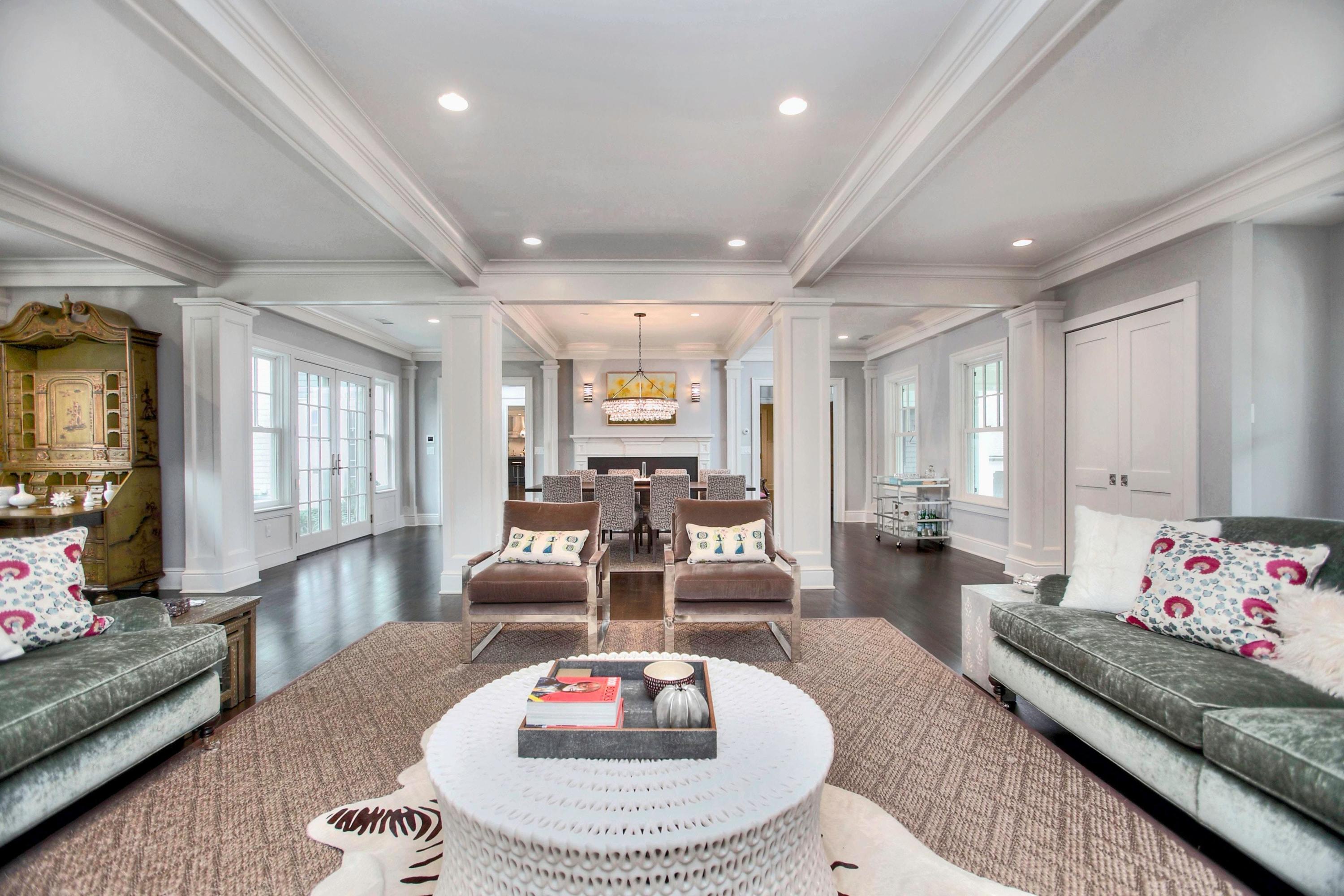 24 Cross Road Darien, CT 06820 - Photo 17 of 53 a living room with furniture and a table