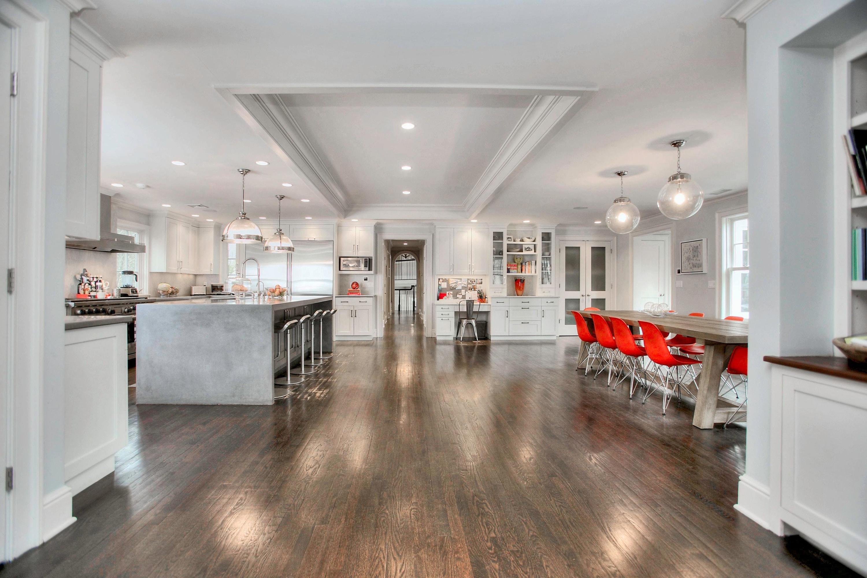 24 Cross Road Darien, CT 06820 - Photo 30 of 53 a living room with stainless steel appliances furniture wooden floor and a kitchen view