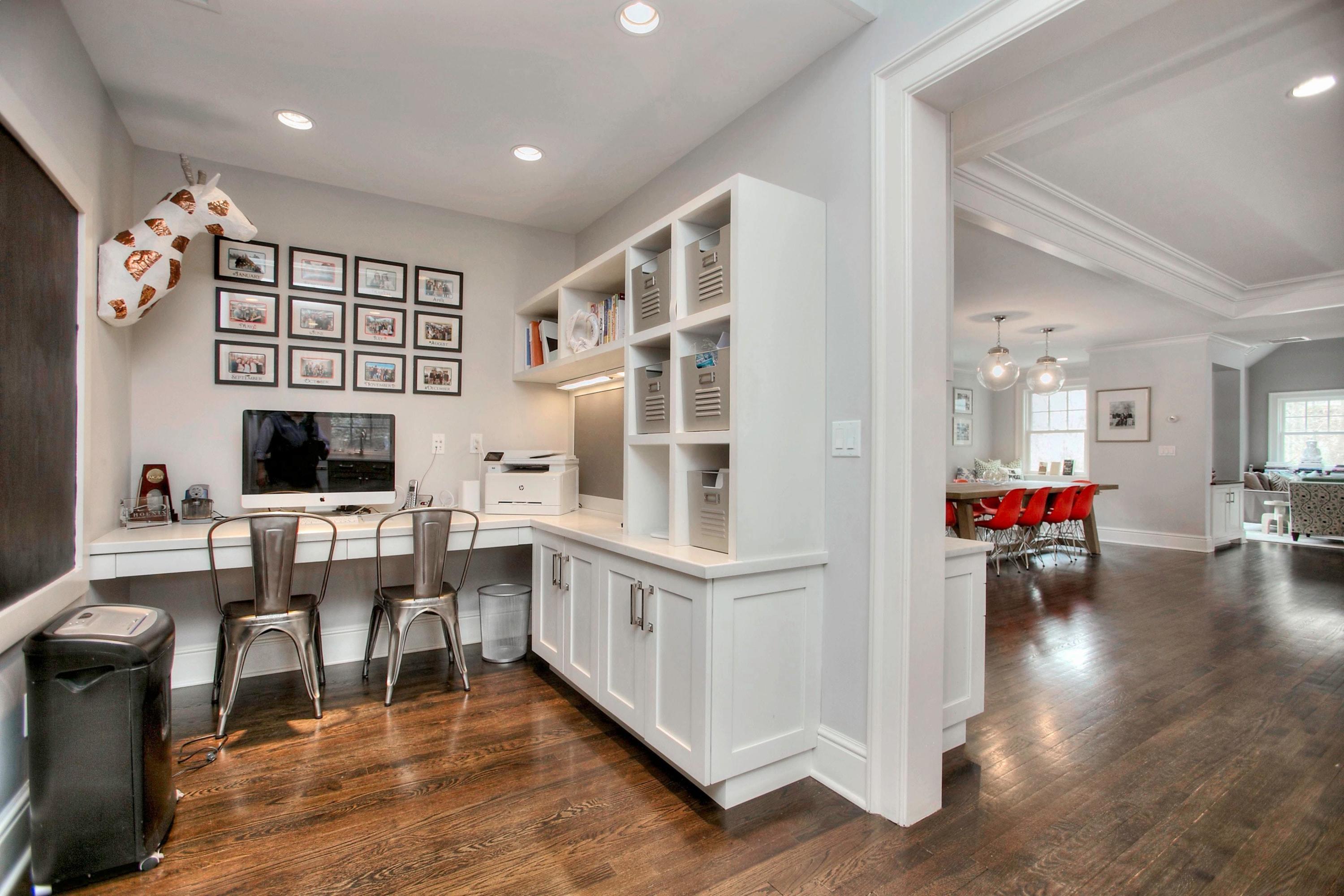24 Cross Road Darien, CT 06820 - Photo 32 of 53 a living room with furniture and a flat screen tv