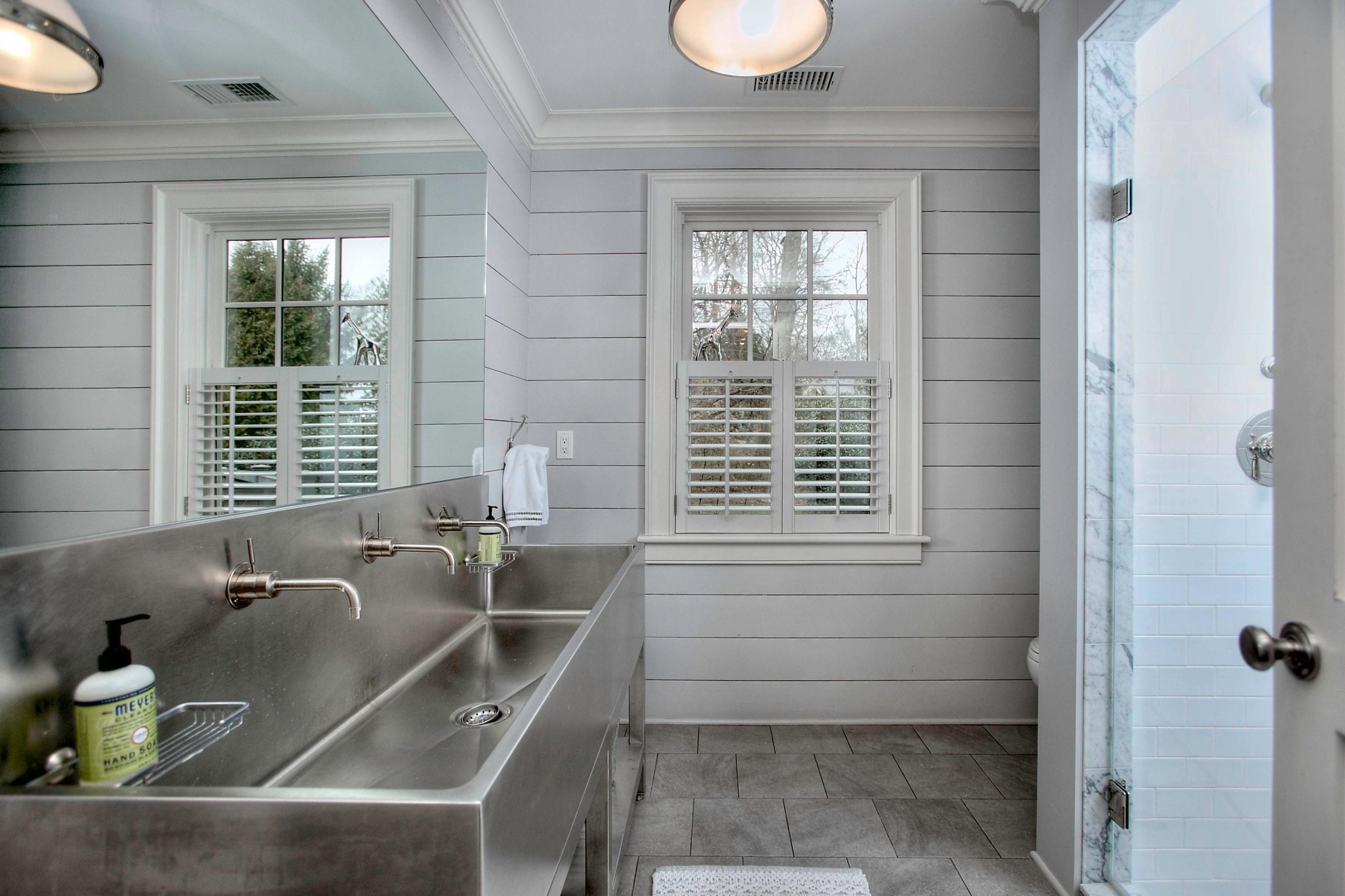 24 Cross Road Darien, CT 06820 - Photo 33 of 53 a bathroom with a sink and a bathtub