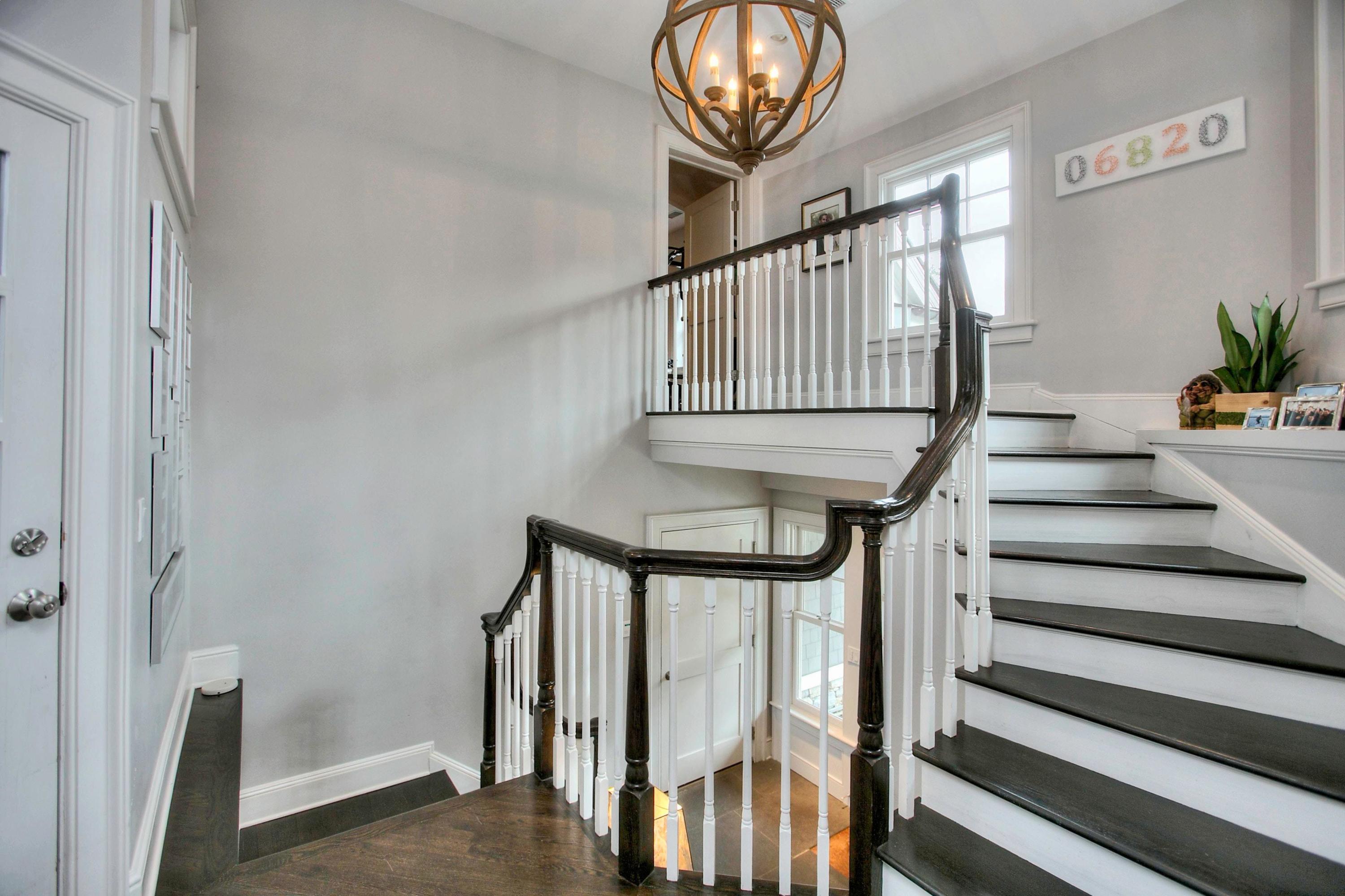 24 Cross Road Darien, CT 06820 - Photo 34 of 53 a view of entryway and hall with wooden floor