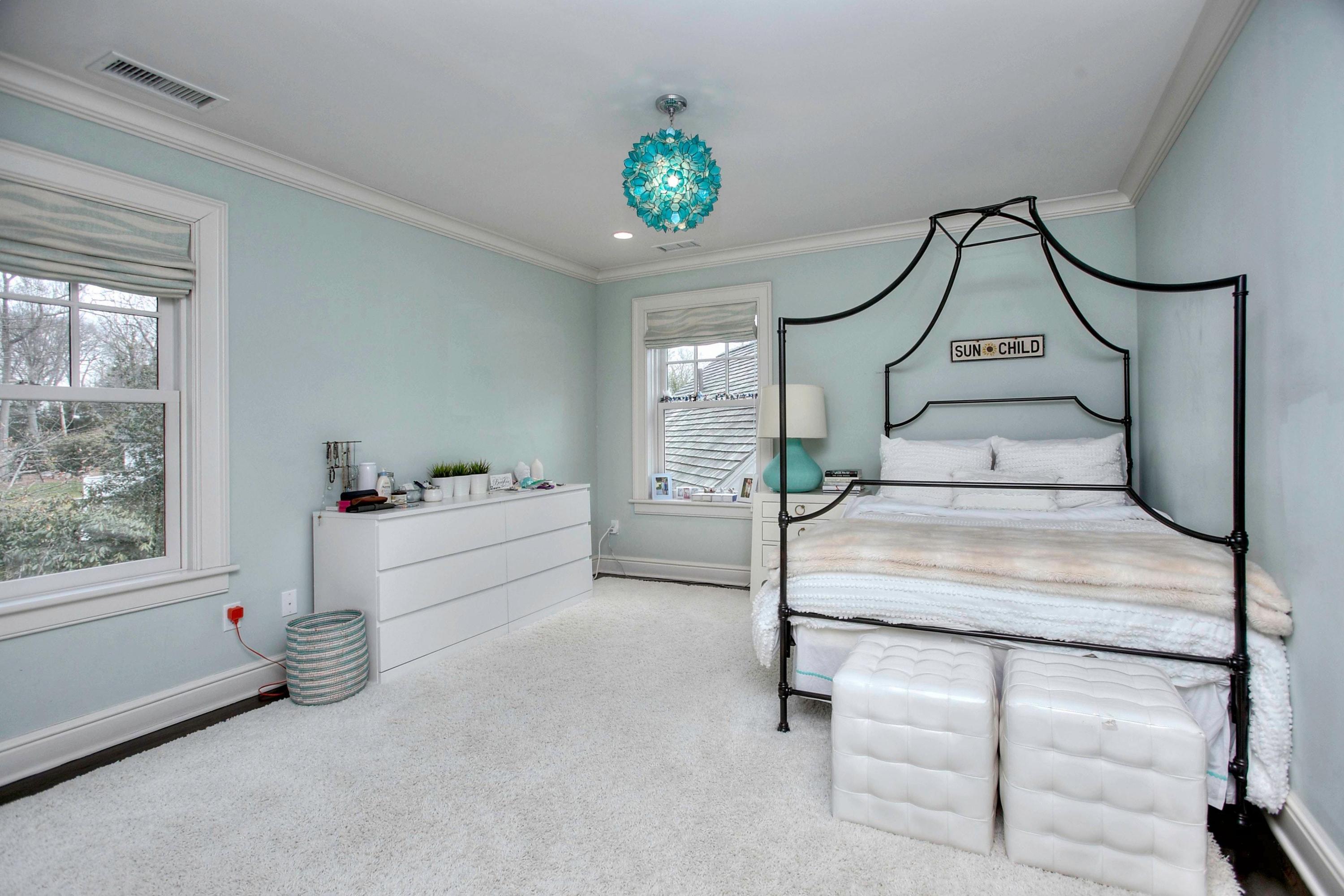 24 Cross Road Darien, CT 06820 - Photo 40 of 53 a bedroom with bed and a window