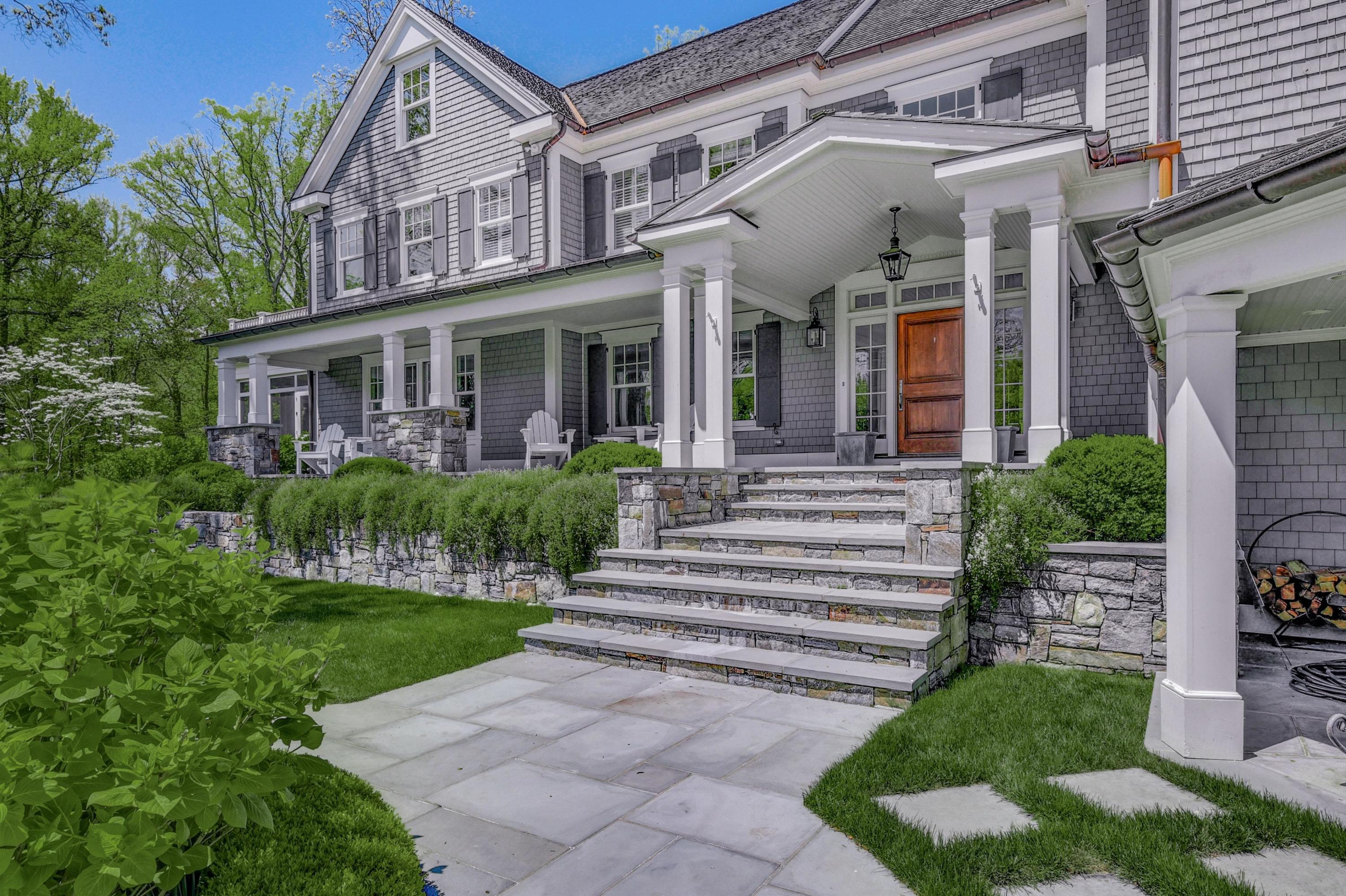 24 Cross Road Darien, CT 06820 - Photo 4 of 53 a front view of a house