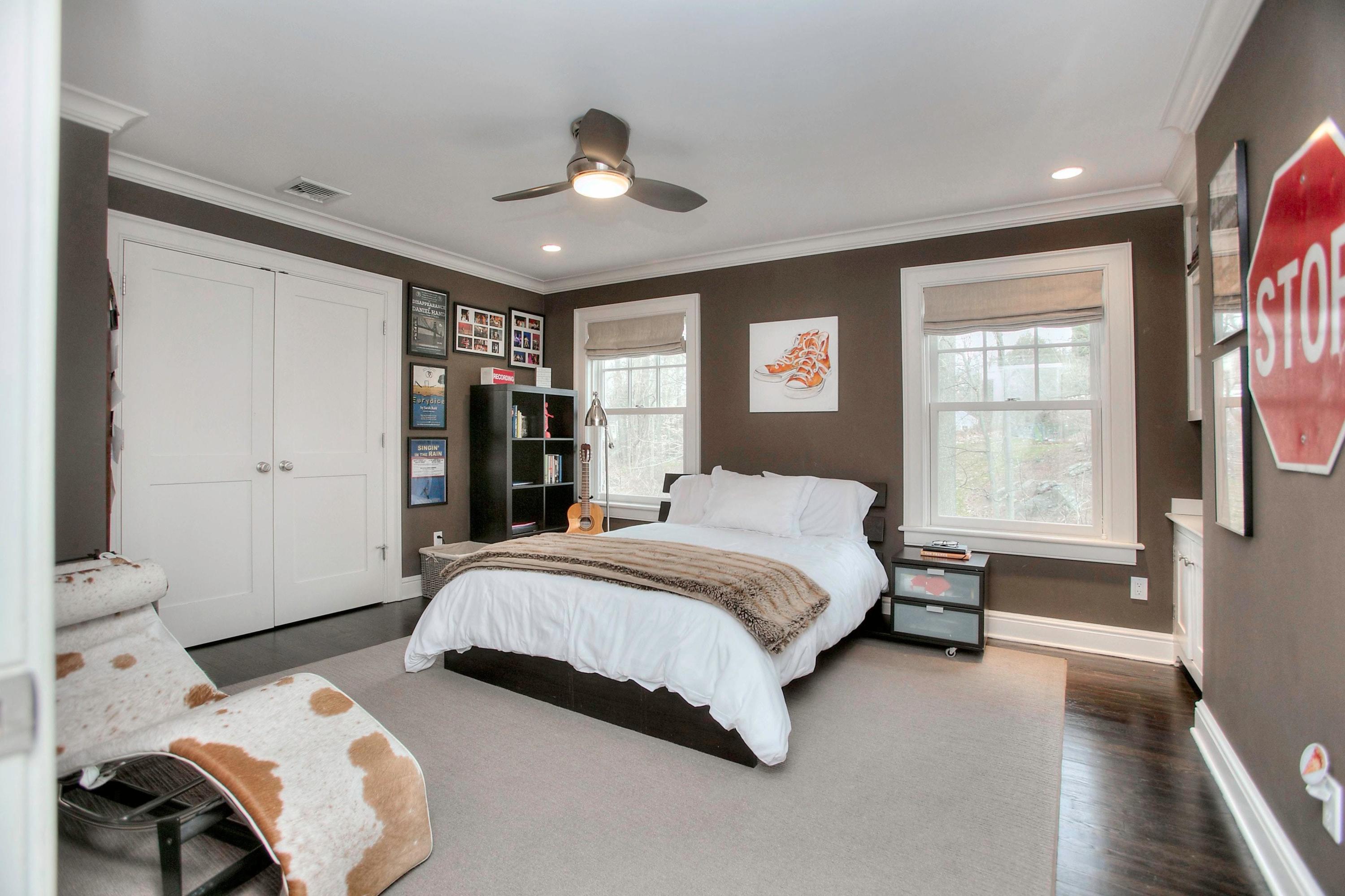 24 Cross Road Darien, CT 06820 - Photo 41 of 53 a bedroom with a bed and a large window