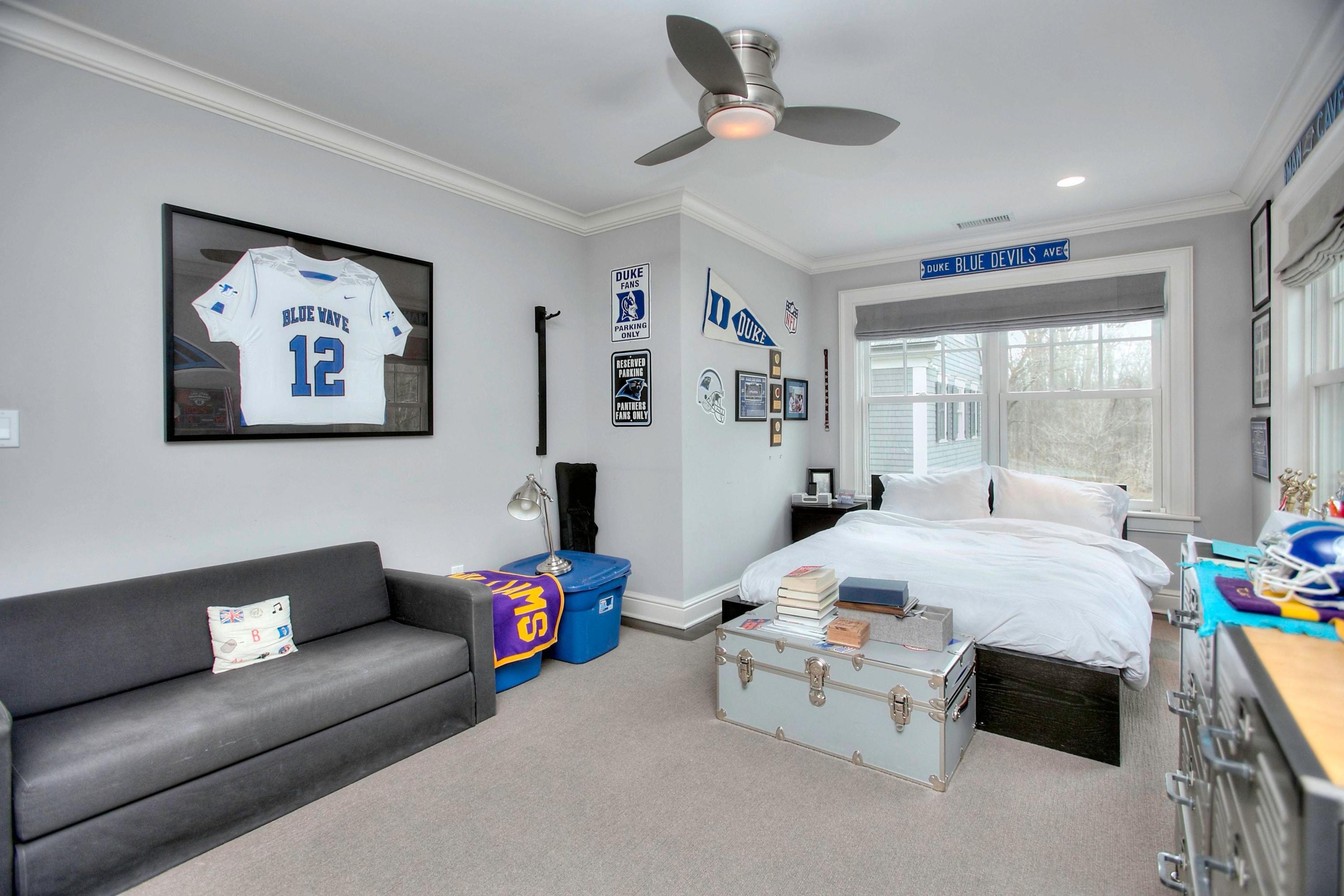 24 Cross Road Darien, CT 06820 - Photo 43 of 53 a living room with furniture and a large window