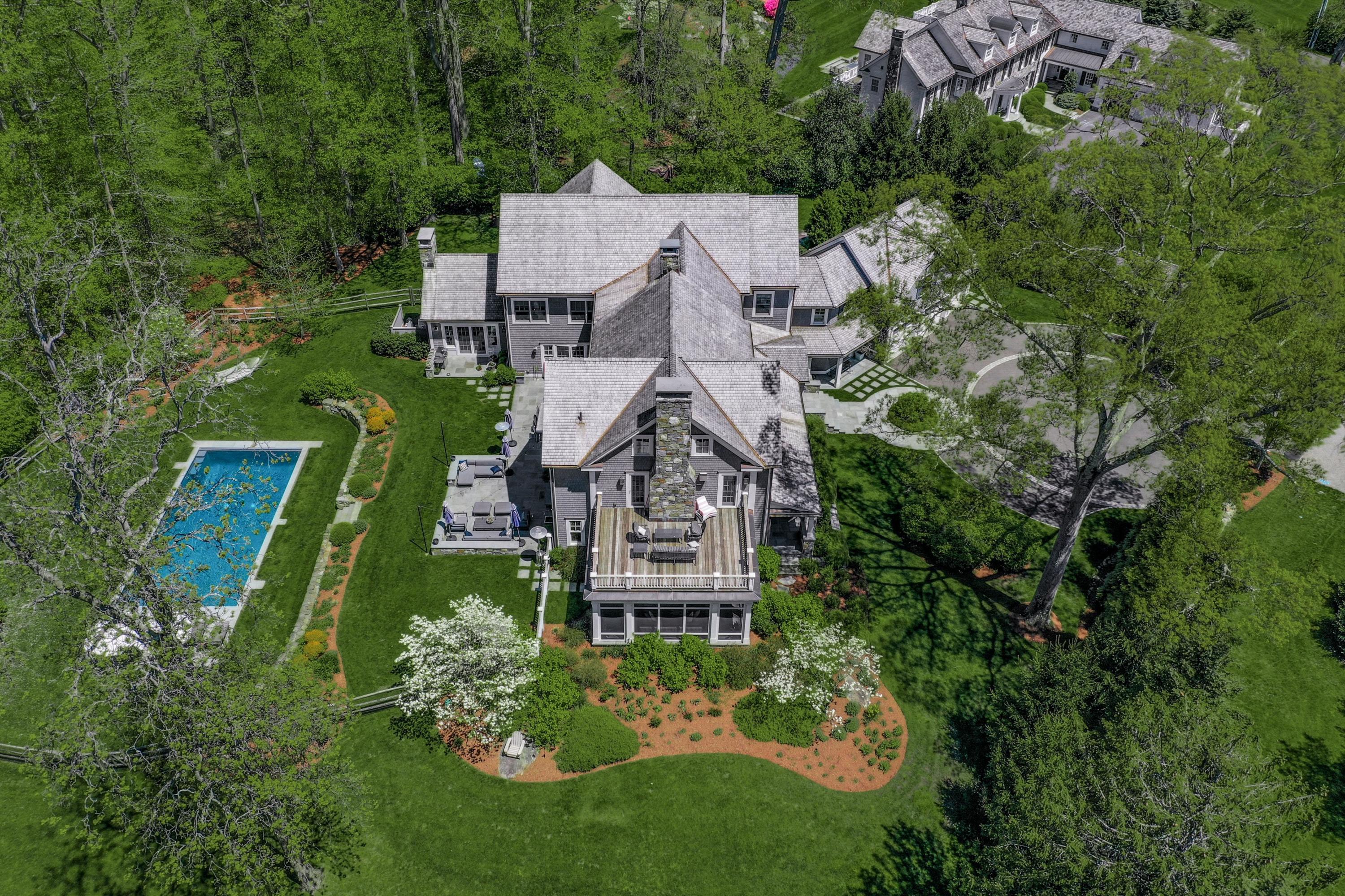 24 Cross Road Darien, CT 06820 - Photo 5 of 53 an aerial view of a house with a garden