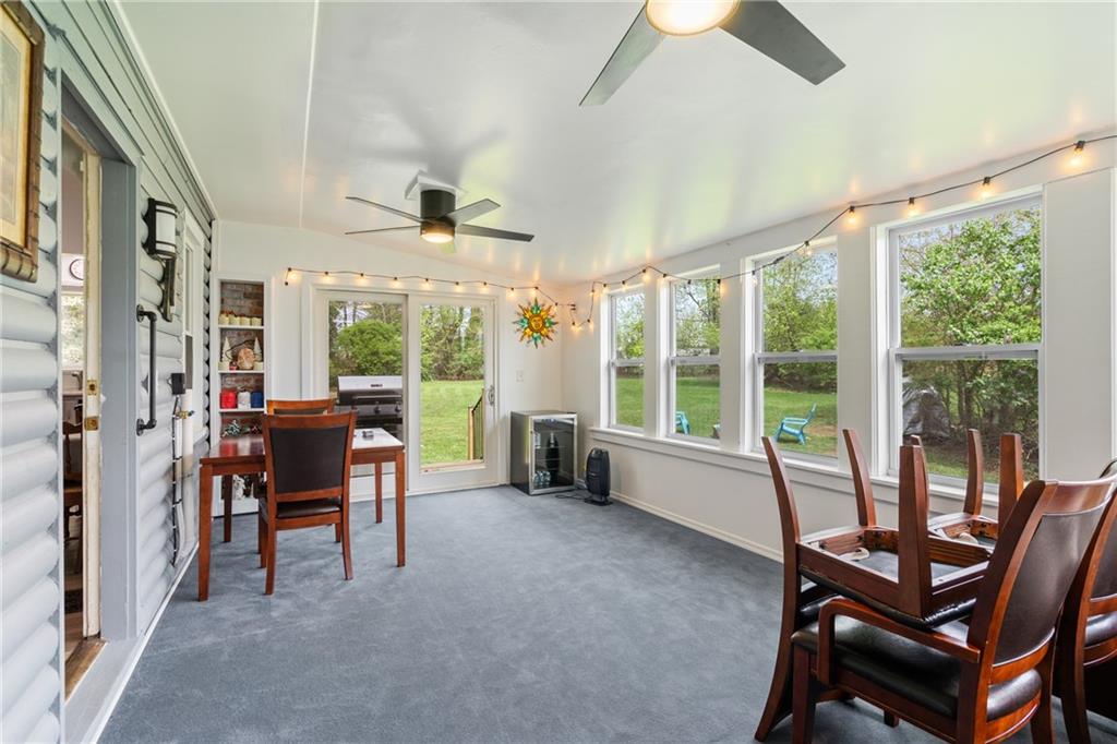 594 Whitestown Road Butler, PA 16001 - Photo 11 of 25 a living room with furniture and a window