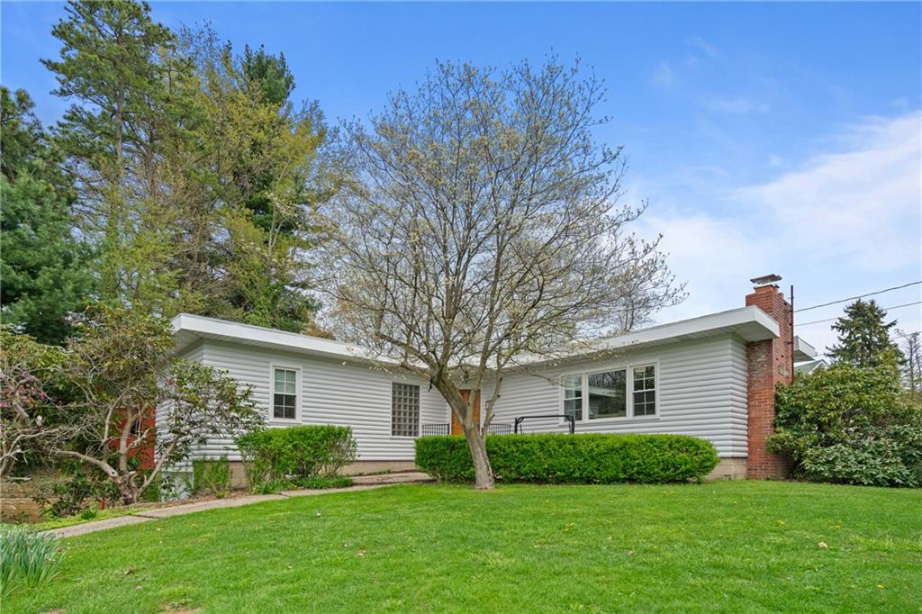 594 Whitestown Road Butler, PA 16001 - Photo 14 of 25 a front view of house with a garden and yard