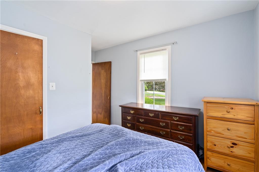 594 Whitestown Road Butler, PA 16001 - Photo 17 of 25 a bedroom with a bed and a dresser