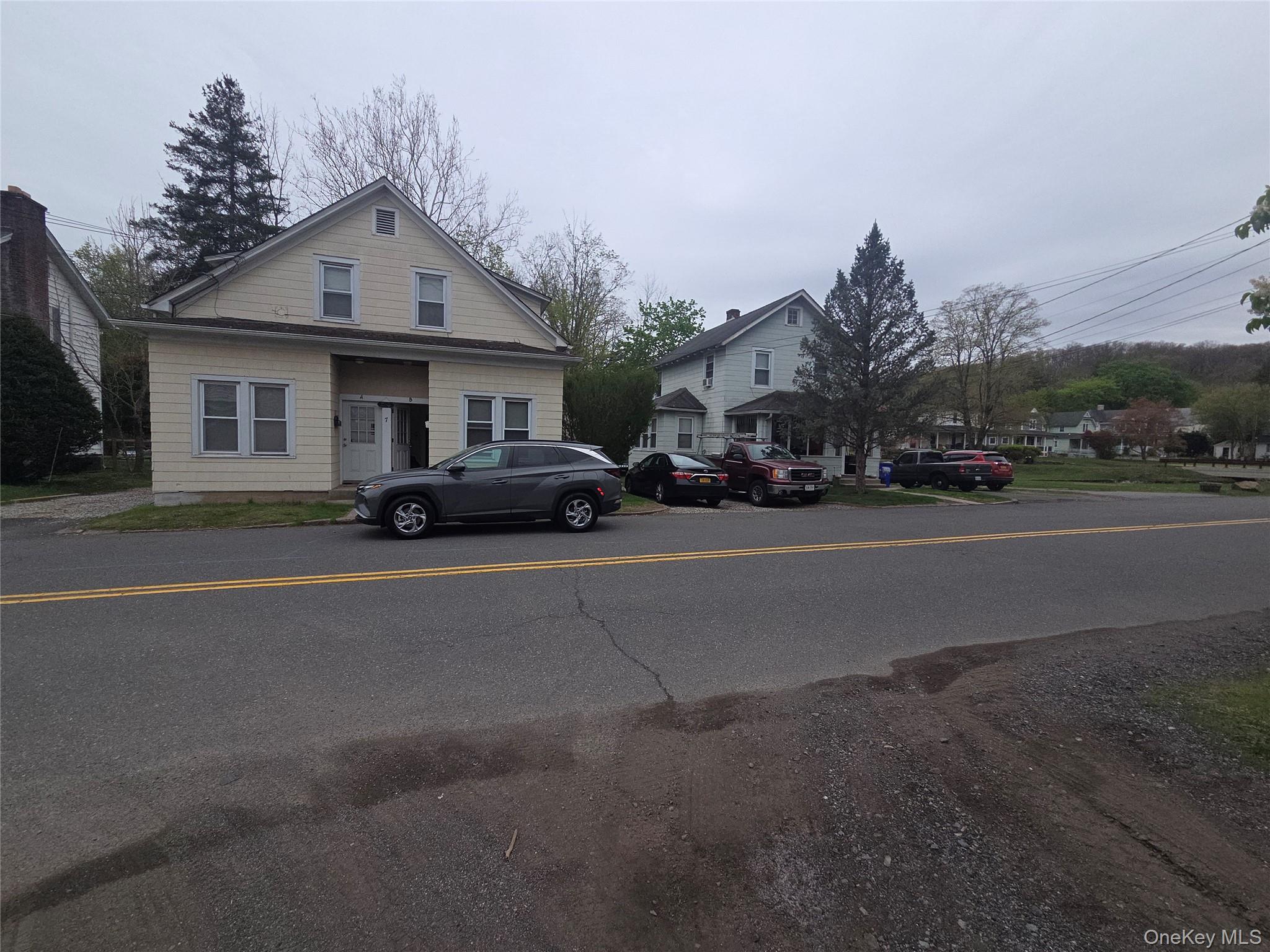 11 Eagle Valley Road, Unit 7 Sloatsburg, NY 10974 - Photo 1 of 24 a view of a car parked in front of a house