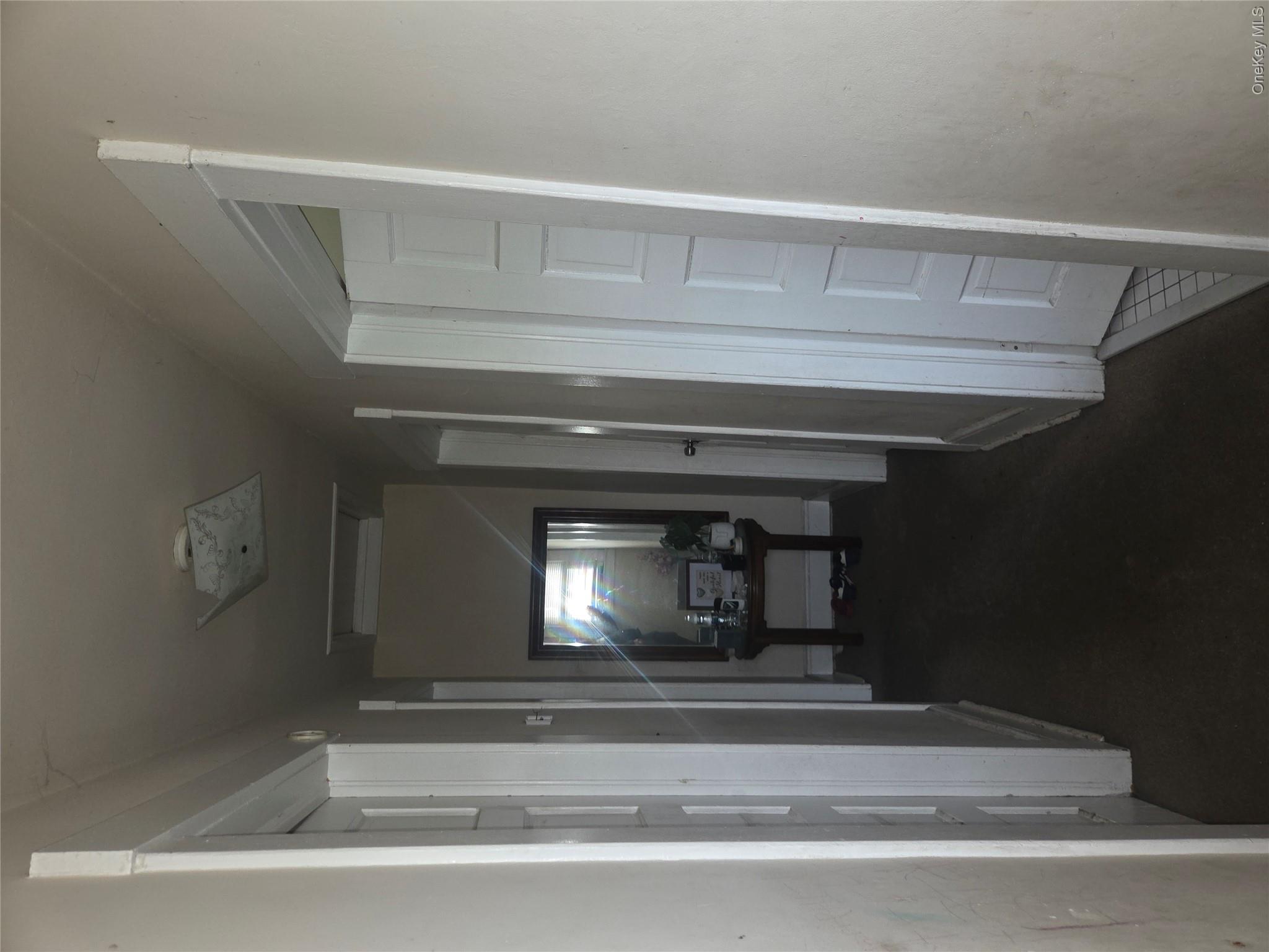 11 Eagle Valley Road, Unit 7 Sloatsburg, NY 10974 - Photo 14 of 24 a view of a hallway and a livingroom with furniture