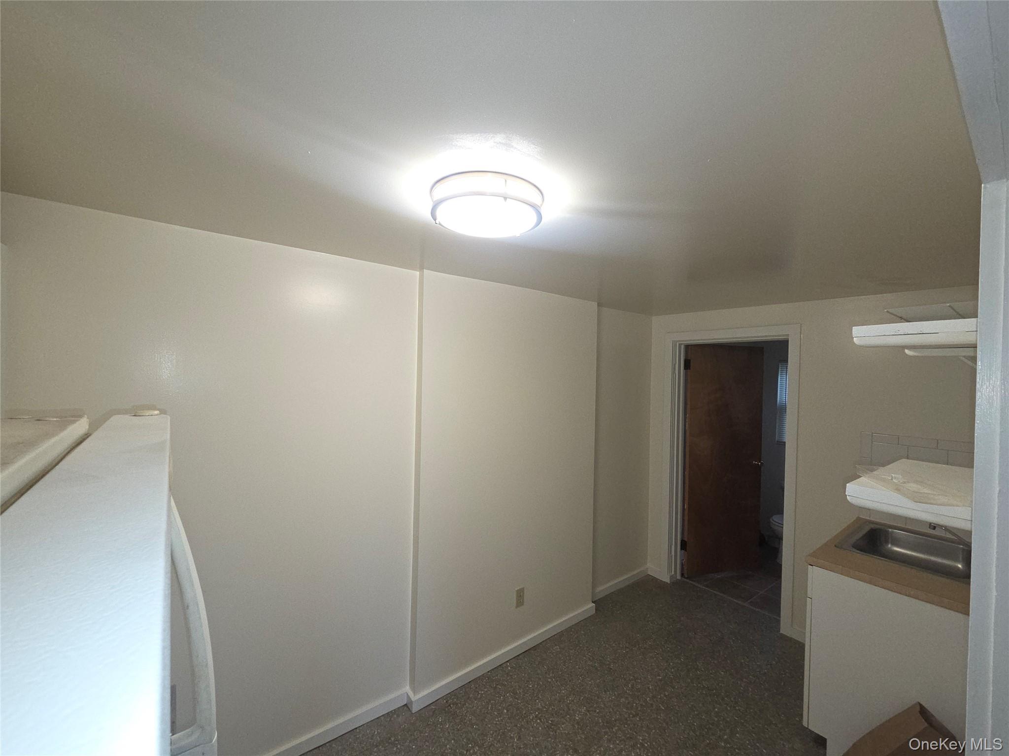 11 Eagle Valley Road, Unit 7 Sloatsburg, NY 10974 - Photo 9 of 24 a view of a hallway with two bathroom