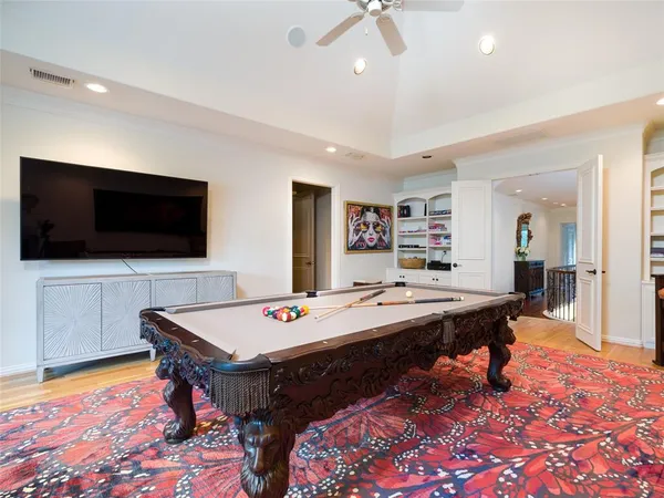 a dining room with a table and chairs