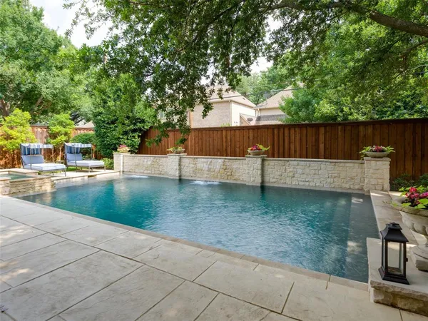 a view of a backyard with a small cabin