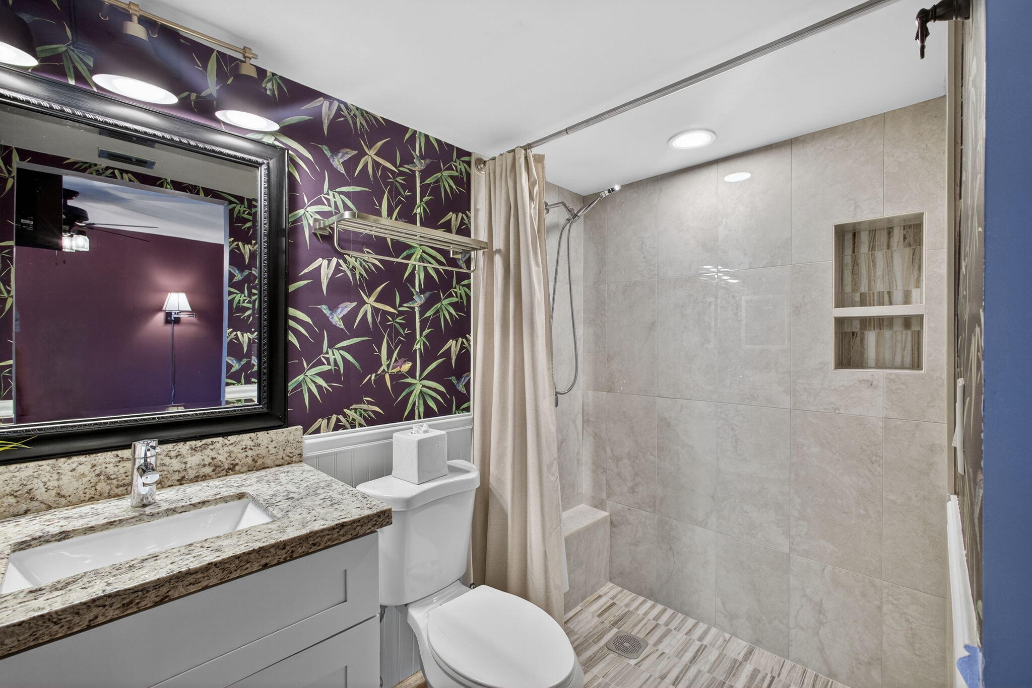 1605 Highway 1, Unit D105 Jupiter, FL 33477 - Photo 18 of 69 a bathroom with a granite countertop sink toilet and shower