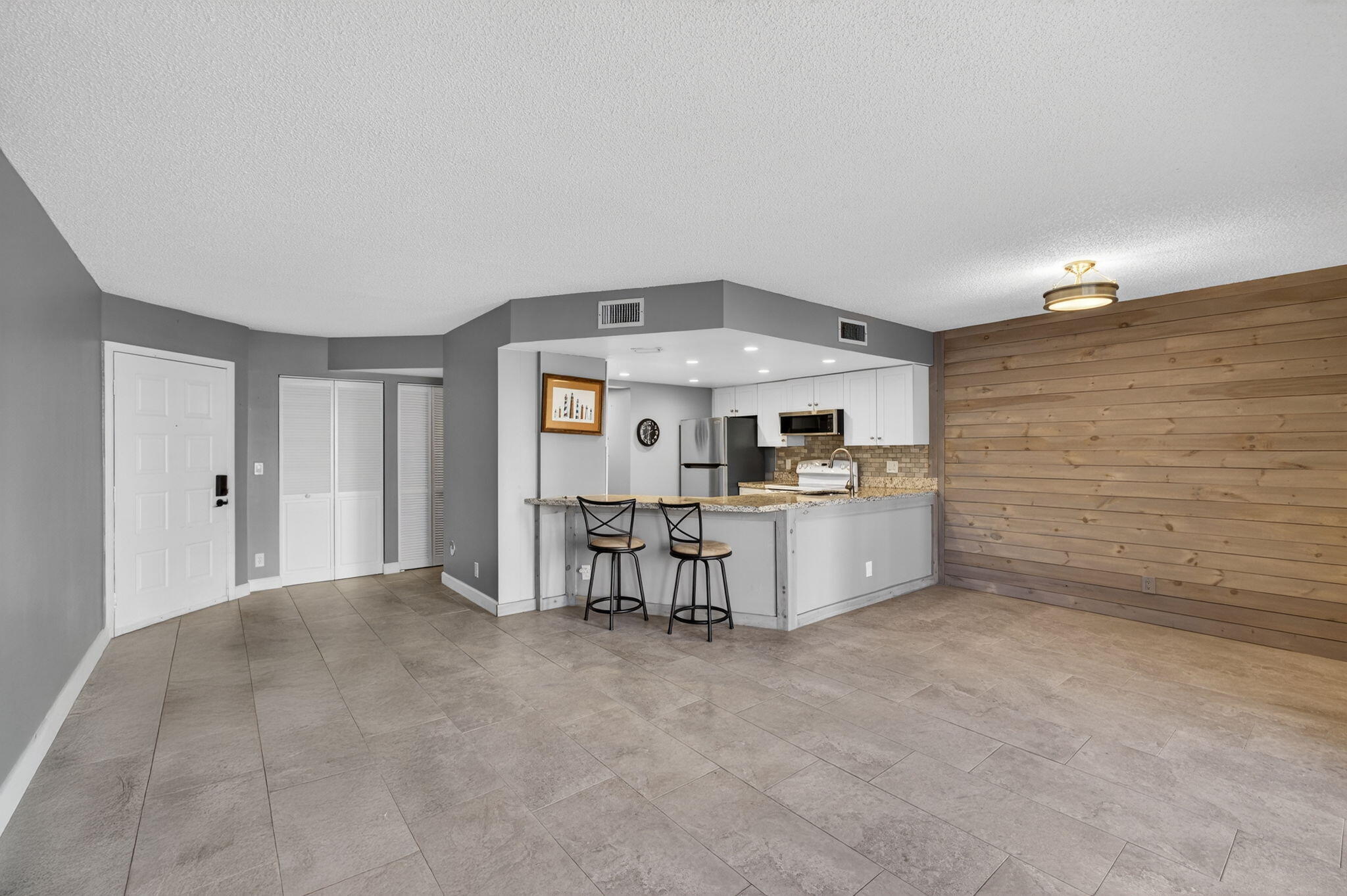 1605 Highway 1, Unit D105 Jupiter, FL 33477 - Photo 23 of 69 Main Room 1