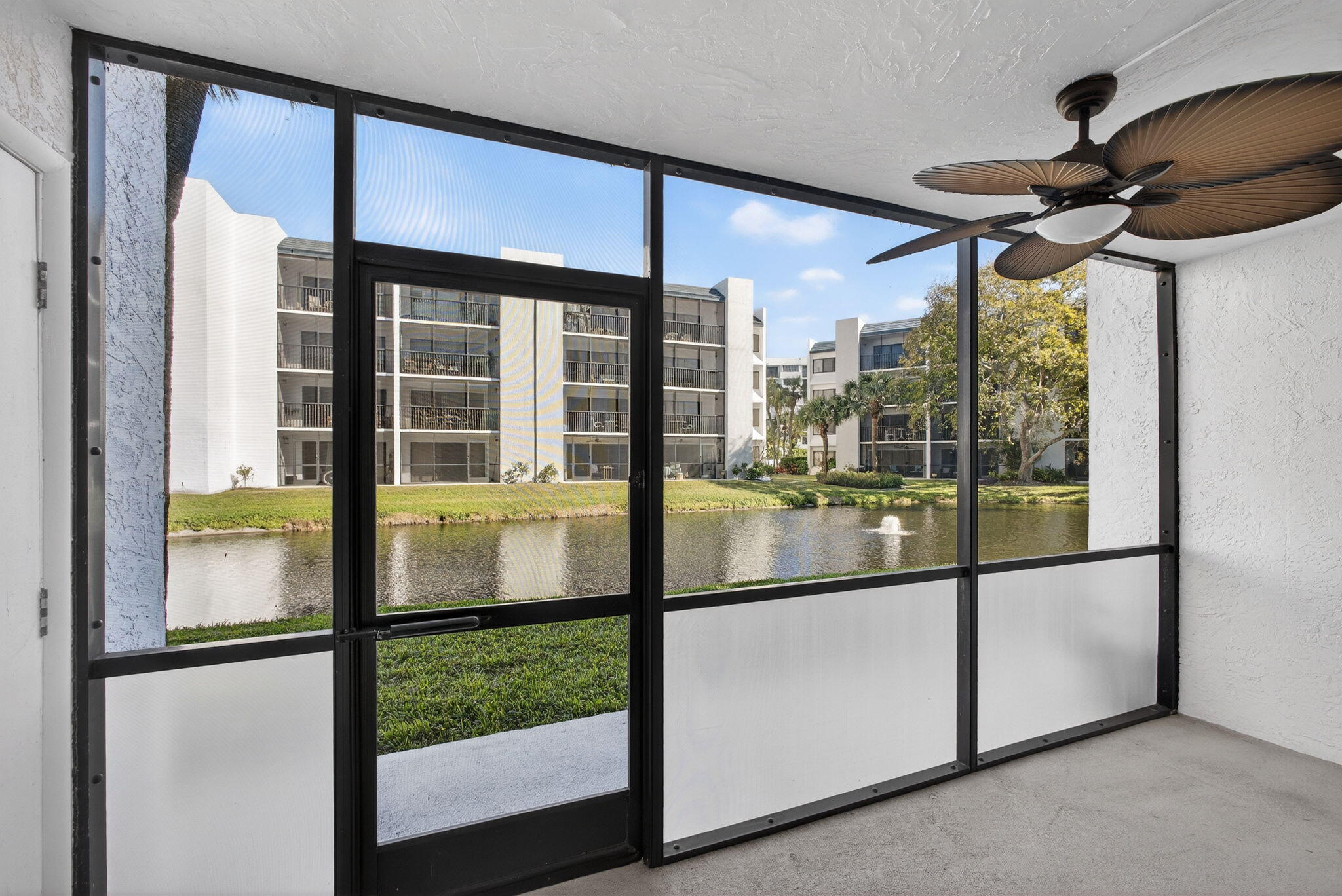 1605 Highway 1, Unit D105 Jupiter, FL 33477 - Photo 29 of 69 a view of a glass door and a balcony