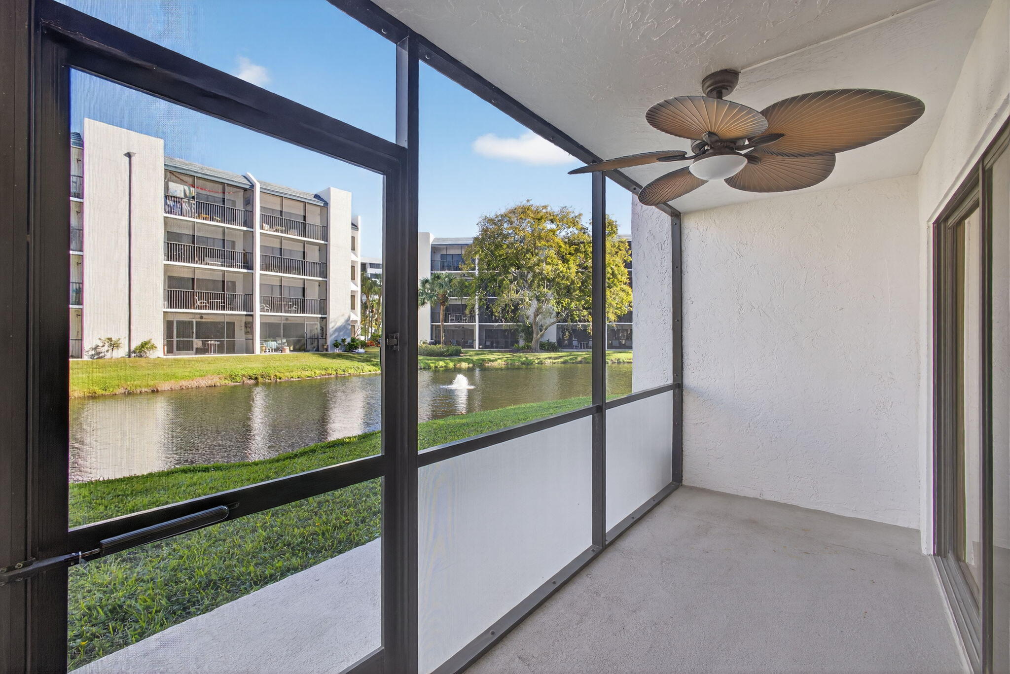 1605 Highway 1, Unit D105 Jupiter, FL 33477 - Photo 30 of 69 a view of swimming pool from a window