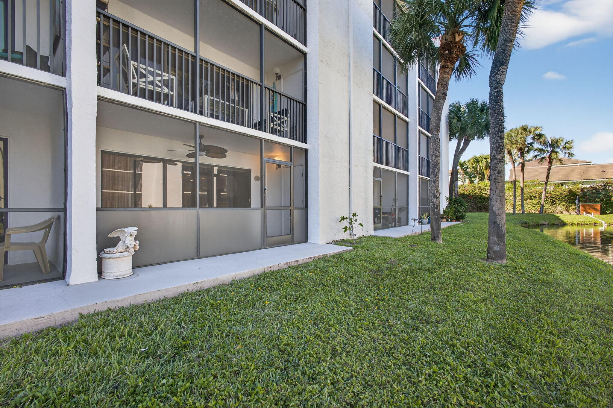 1605 Highway 1, Unit D105 Jupiter, FL 33477 - Photo 37 of 69 a view of an apartment with a backyard