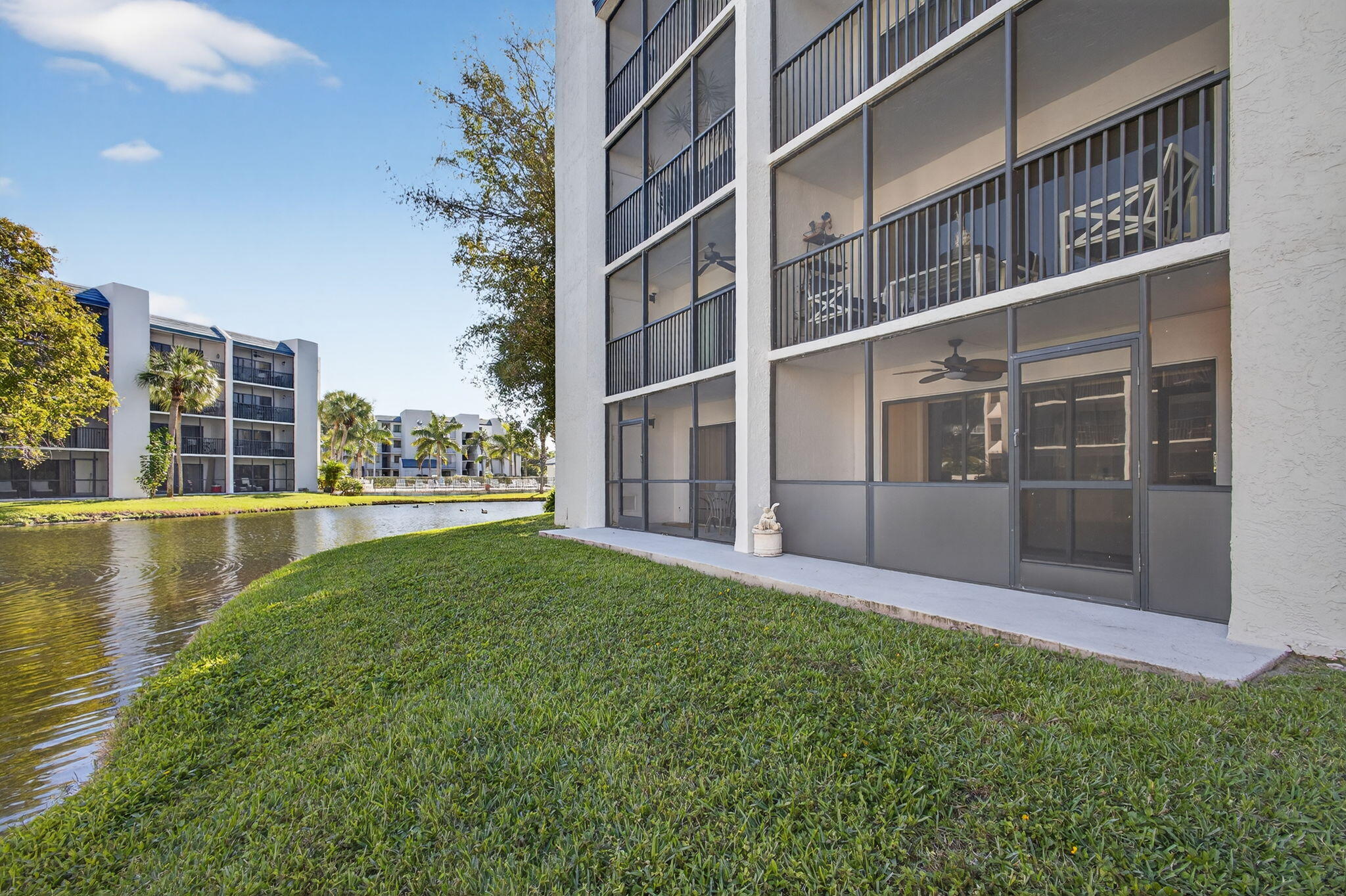 1605 Highway 1, Unit D105 Jupiter, FL 33477 - Photo 38 of 69 a view of an apartment with a swimming pool