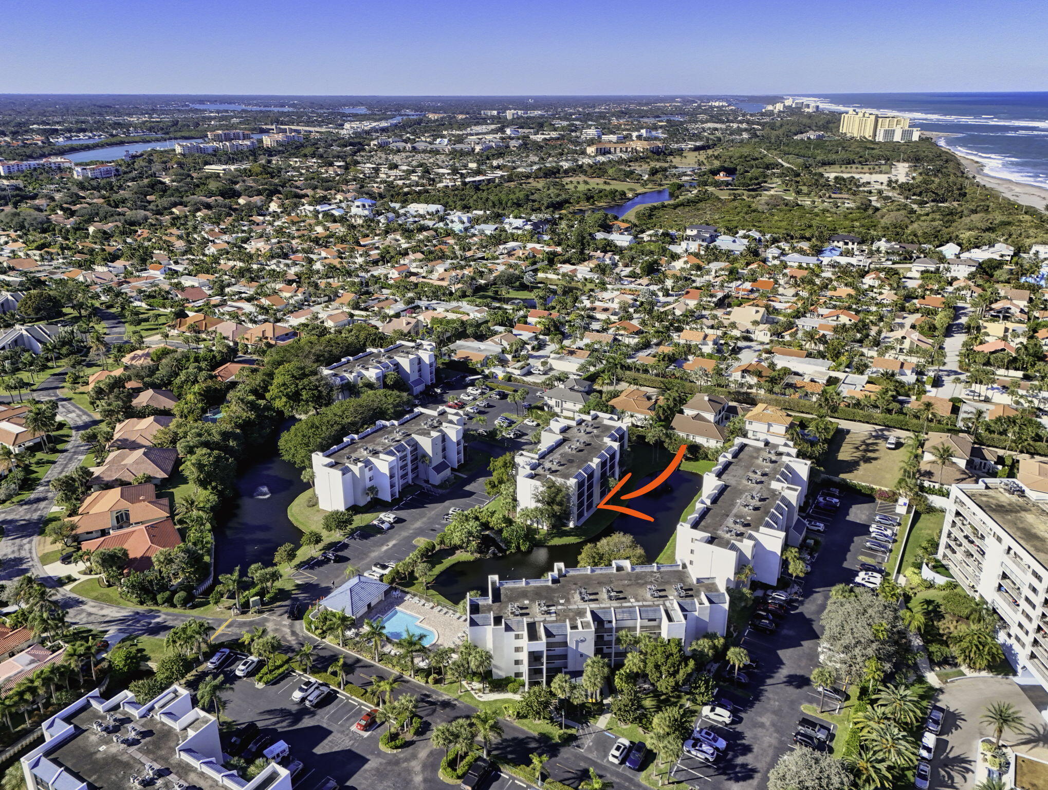 1605 Highway 1, Unit D105 Jupiter, FL 33477 - Photo 59 of 69 an aerial view of a city with lots of residential buildings